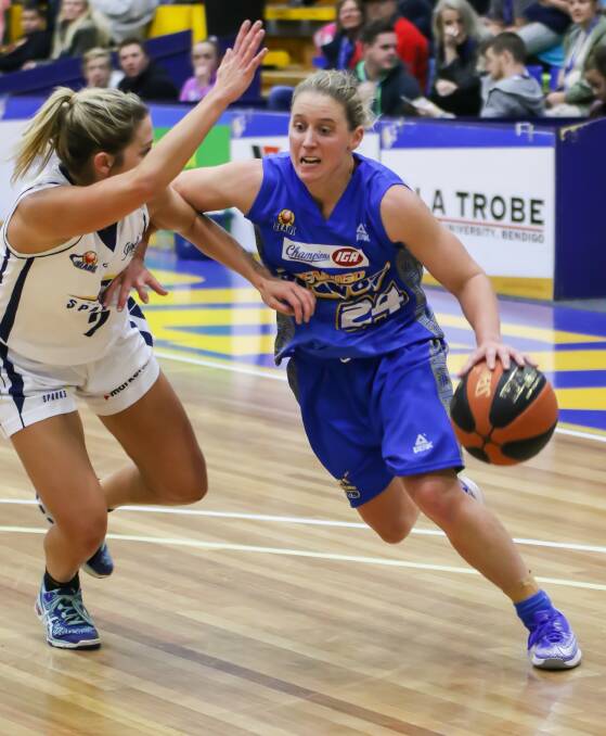 TOP TWO: Jane Chalmers drives to the basket for the Bendigo Lady Braves.