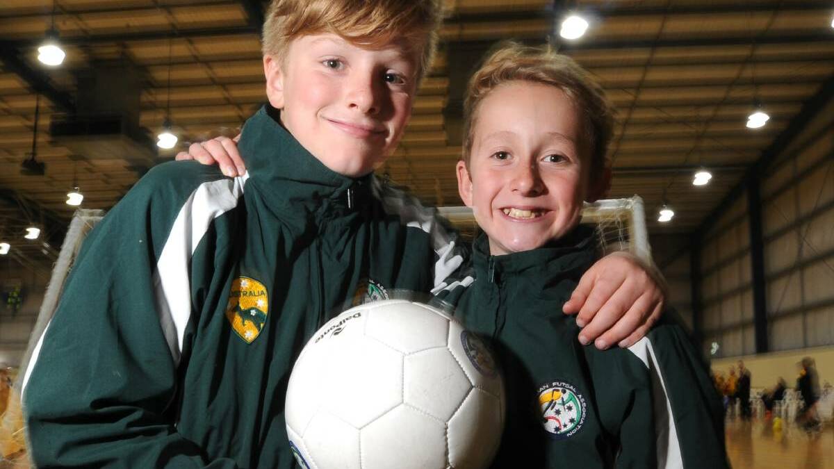 Mac Hilson (right) with his futsal and soccer teammate Hamish Walker.