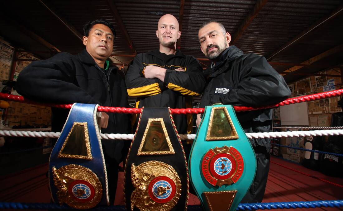 WINNING COMBINATION: Boxing promoters Narongwas Buamas and Lynden Hosking, from Bendigo-based Hosking Promotions, with Bendigo's former Australian heavyweight champion Justin Whitehead. Picture: GLENN DANIELS