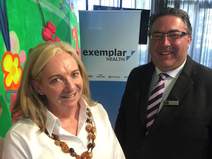 Examplar Health chief executive Michele Morrison and Colliers International executive Travis Hurst. 