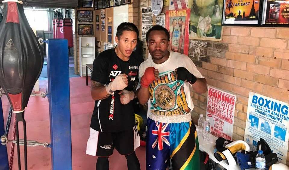 Bendigo boxer Dino Rafaeles and Omari Kimweri are pictured at the Vinton Street Gym in 2017 before the Tanzanian-born fighter's WBC world minimum-weight title fight in Thailand.