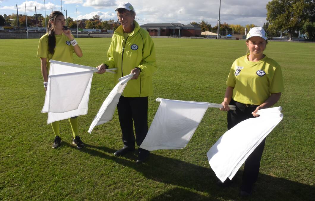 WELL DRILLED: Field umpire Bronte Annand, with goal umpires Noel Ridge and Mikayla Ford. Picture: KIERAN ILES