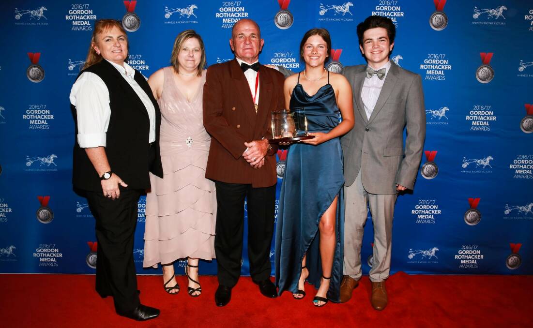 Jim O'Sullivan with his family after being awarded the Gordon Rothacker Medal. Picture: HARNESS RACING VICTORIA