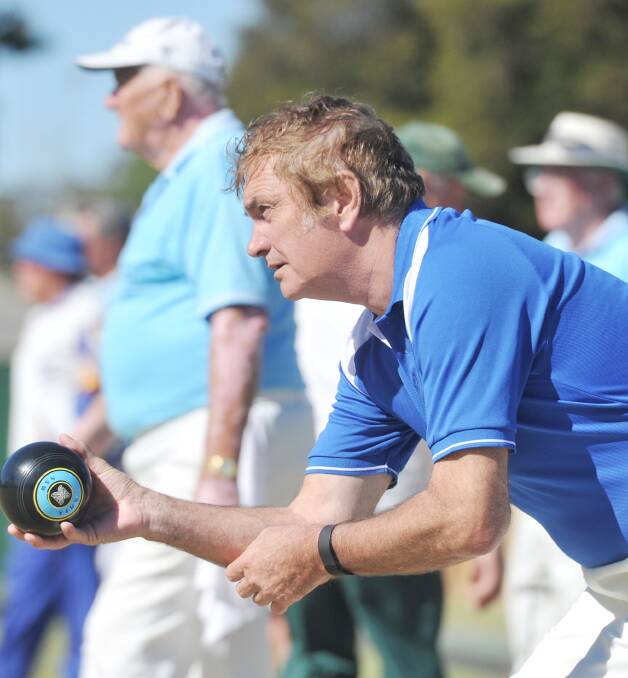 Allan Berry sizes up his opportunity during day two of the three-day bowls event.