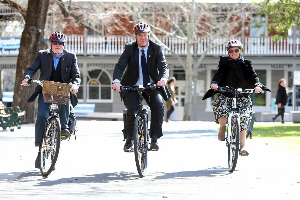 RIDE HAPPY: Council staff riding bikes as part of a campaign to encourage people to ride to work in 2015. 