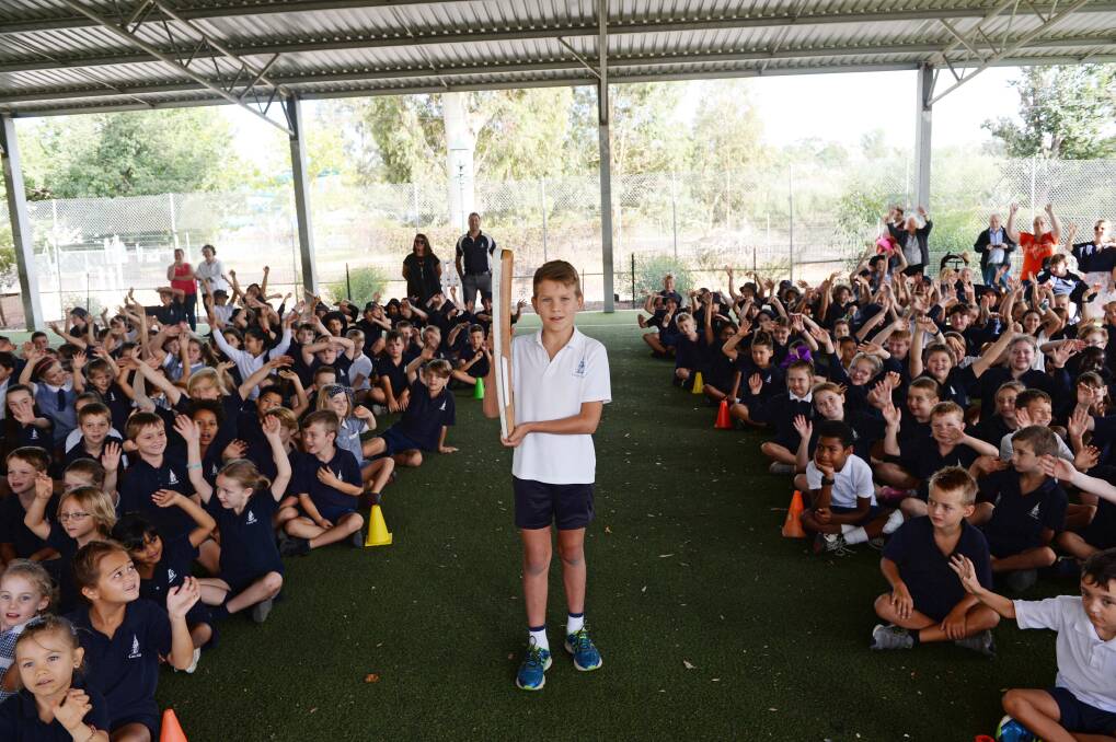 HOLD TIGHT: The baton was first introduced to Bendigo at Camp Hill primary school. Picture: DARREN HOWE
