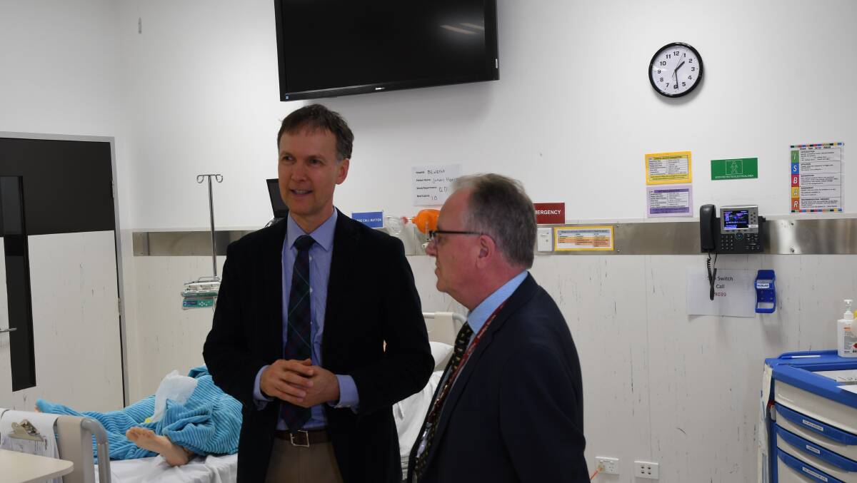 RURAL HEALTH: Rural health commissioner Paul Worley (left) chats with Bendigo Health CEO Peter Faulkner in a hospital simulation room.