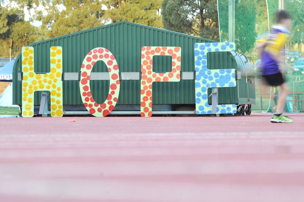 INSPIRATION: Messages of support adorned the athletics track at the La Trobe University athletics complex. Picture: Noni Hyett.