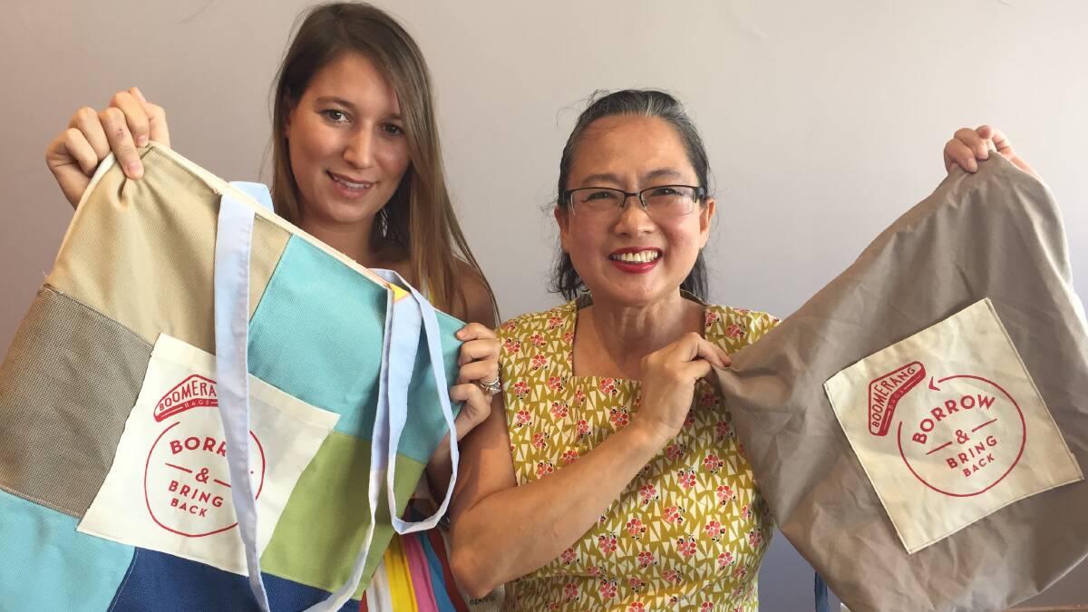 STITCH IN TIME: Boomerang Bags organisers in Castlemaine, Nellie Harris and Ginny Tan. Picture: CHRIS PEDLER