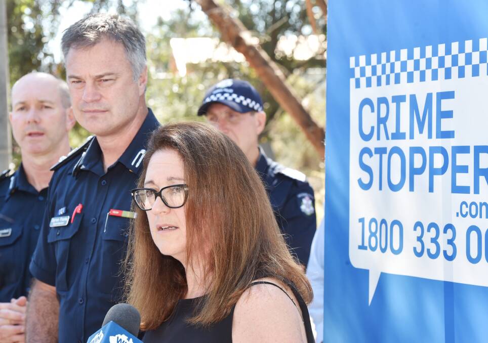 Superintendent Darren Franks and Crime Stoppers' Cathy Rhodes at the launch of a crime crackdown campaign in Bendigo recently. Picture: DARREN HOWE