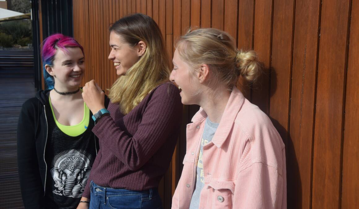 Hannah Downing, Kerry Bianchi and Rachel Doughty share a laugh on orientation day. Picture: MARK KEARNEY