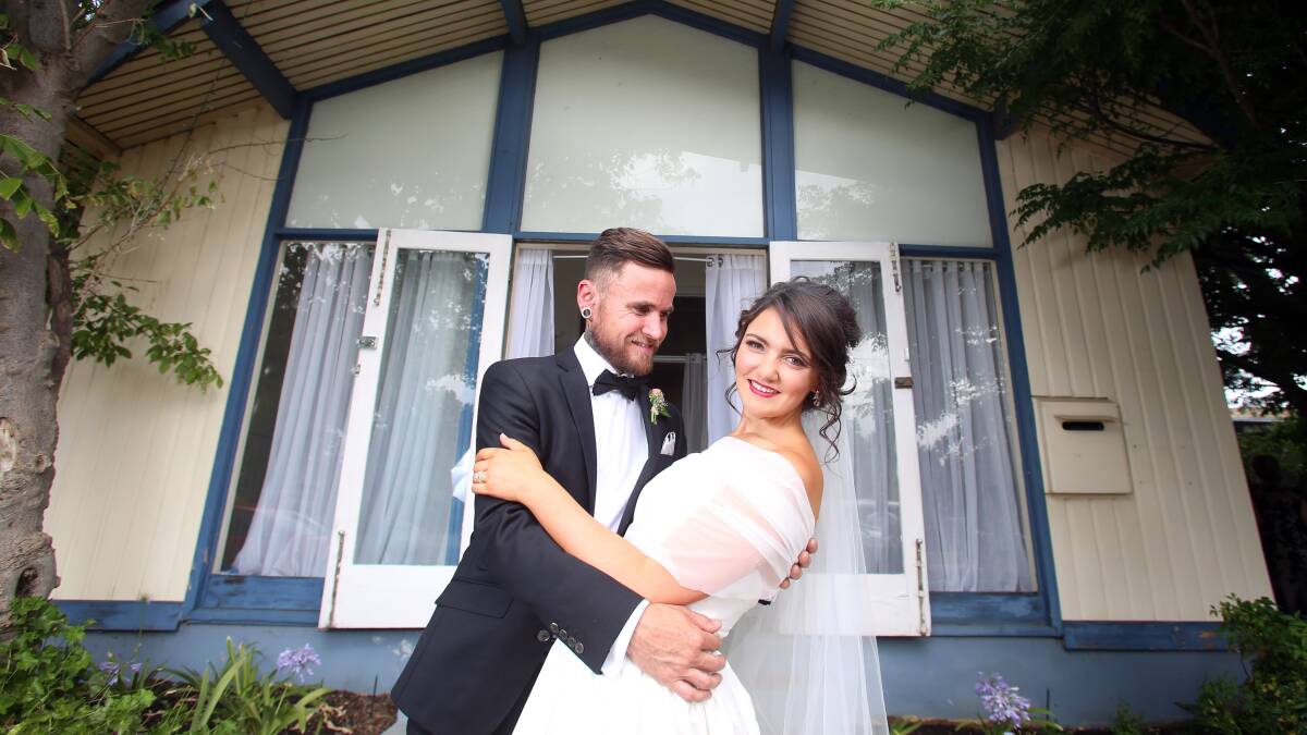 I DO: Dan Osment and Bethany Jarvis on their wedding day. Picture: GLENN DANIELS