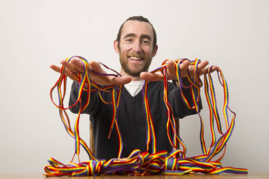 Matt Keane is selling rainbow laces to supporters of marriage equality. Picture: GLENN DANIELS