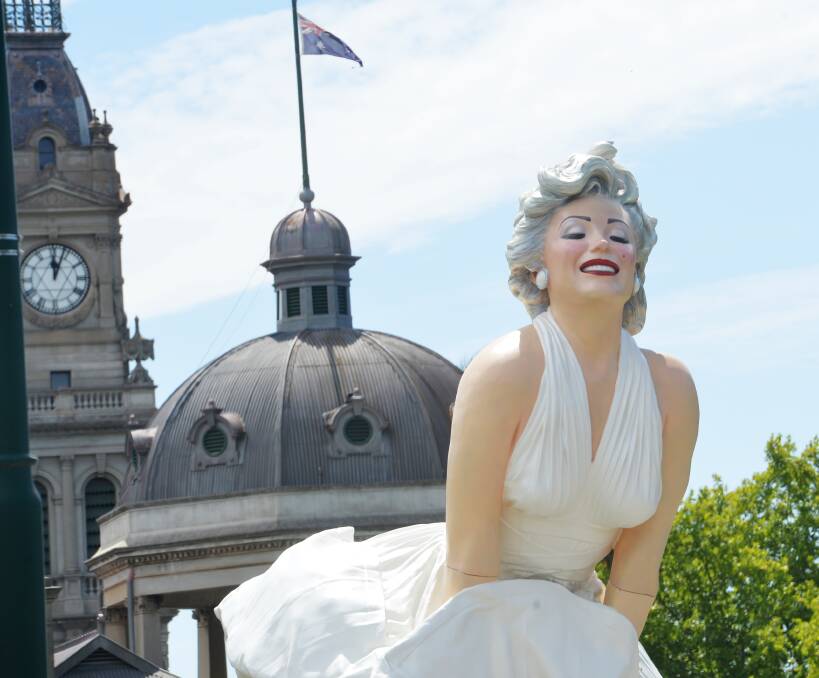 FLASH IN THE PARK: Forever Marilyn, the eight-metre tall sculpture of beloved screen siren Marilyn Monroe on loan to the Bendigo Art Gallery, was unveiled in Rosalind Park on Tuesday. Picture: DARREN HOWE