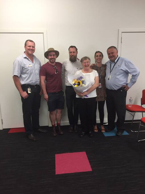 Jude Munro (with flowers) after her time with Bendigo service providers. Picture: CONTRIBUTED