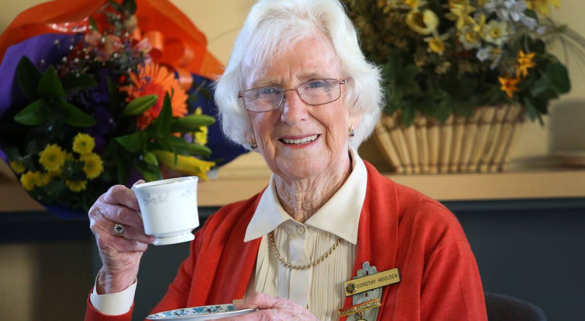 CHEERS: Dorothy Houlden raises a tea cup to six decades of community service with local CWA branches. Picture: GLENN DANIELS