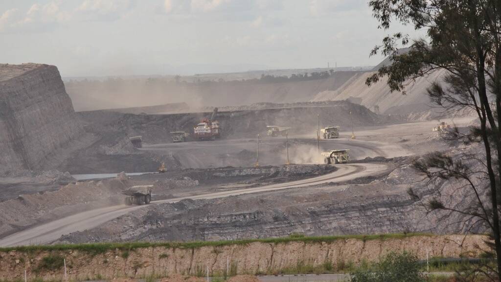 Gasping: Dust creation at an Upper Hunter open cut mine. Doctors have backed calls for coal mining to be included in a scheme where polluters pay for the consequences of the industry.  