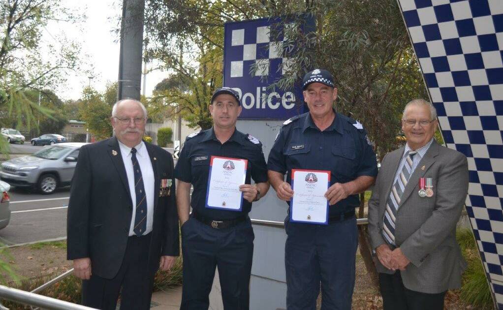 Thanks: RSL President Robert Bail, acting Senior Sergeant Paul Filbey, Sergeant Geoffrey Annand and Welfare Officer Russell Arnold. Photo: Craig Chilver