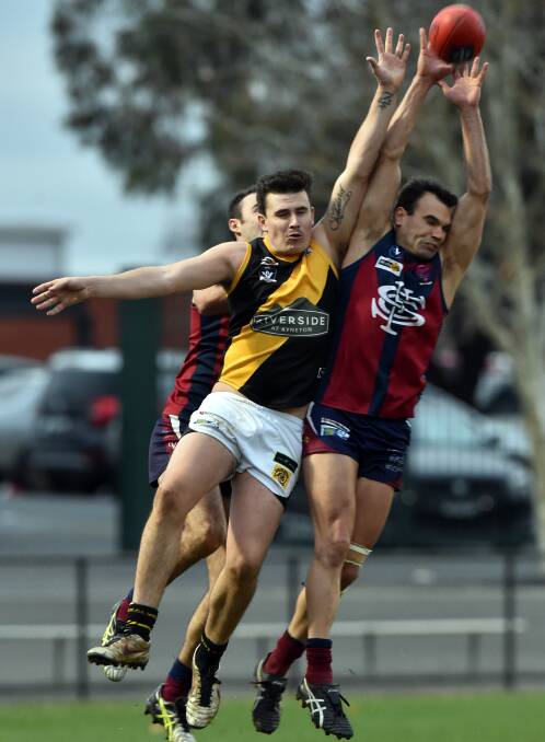 CONTESTED MARK: Sandhurst's Zac East attempts to mark in Saturday's impressive win over Kyneton. Pictures: BILL CONROY