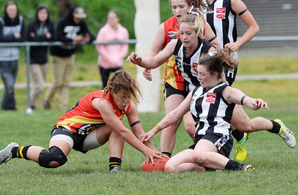 SEASON FINALE: Woorinen and Castlemaine played out an entertaining game in the youth girls grand final. Pictures: DARREN HOWE