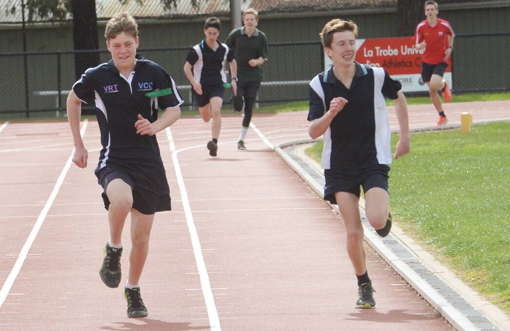 TIGHT FINISH: Track action at the Victory Christian College athletics carnival at the Flora Hill complex. Picture: DARREN HOWE
