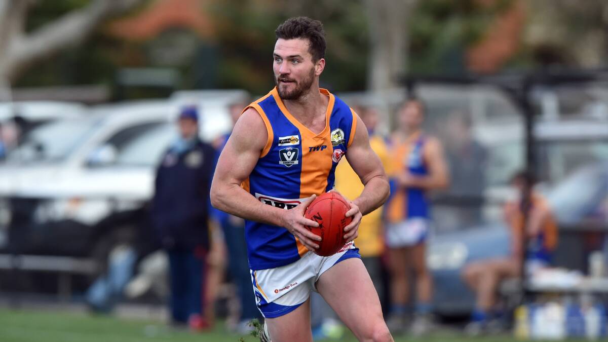 UP AND ABOUT: Golden Square's Travis Baird was best on ground.