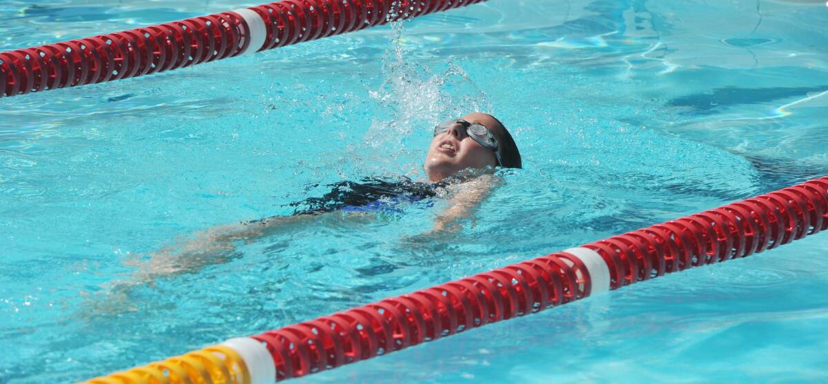 SPEED MACHINE: Phoebe Wright powers down the pool in the backstroke.
