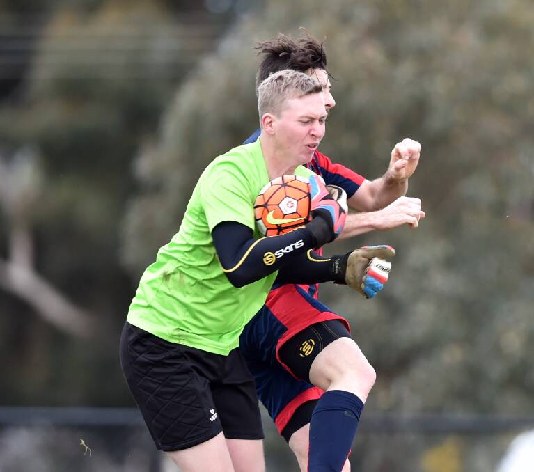 GOOD GRAB: Spring Gully goal keeper Tyler Lewis collects the ball. Picture: GLENN DANIELS