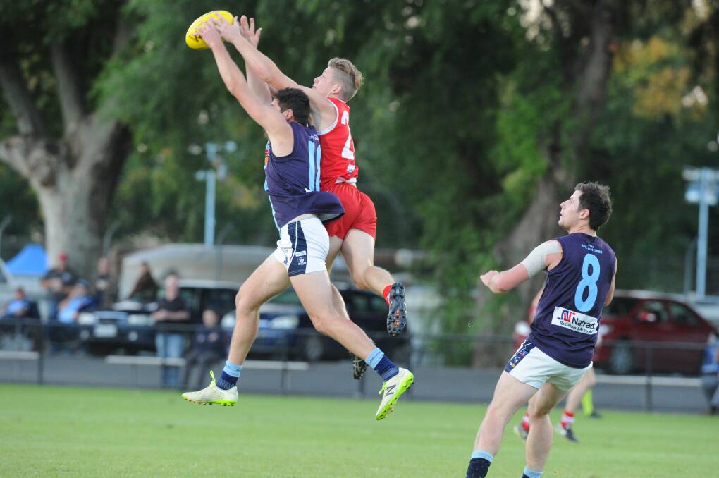 Kaiden Antonowicz flies for a mark against Eaglehawk in round one. Picture: NONI HYETT