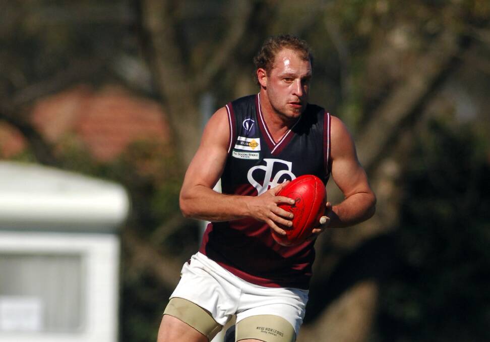 MILESTONE: Wayne Mitrovic in action for Sandhurst in 2007. The key forward will play his 100th senior game for the club on Saturday. 