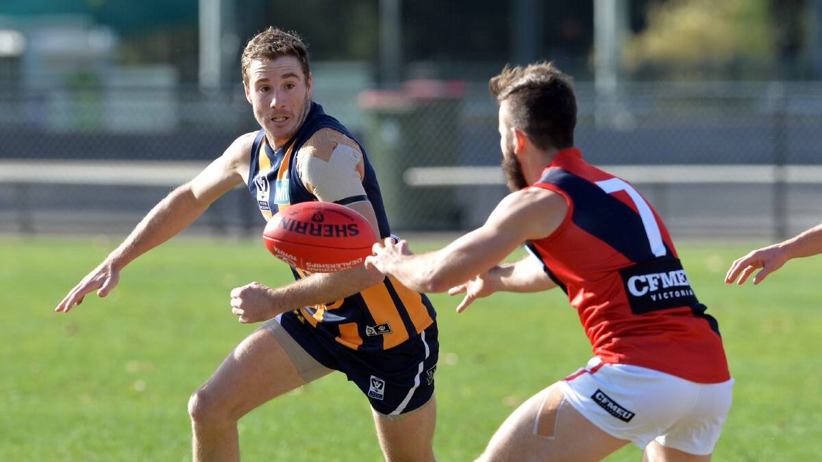 Tyrone Downie in action for the Bendigo Gold in 2014.