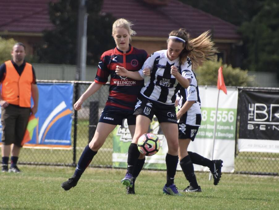 TIGHT BATTLE: Action from the Epsom versus Shepparton South women's clash at Epsom on Sunday. Picture: CONTRIBUTED