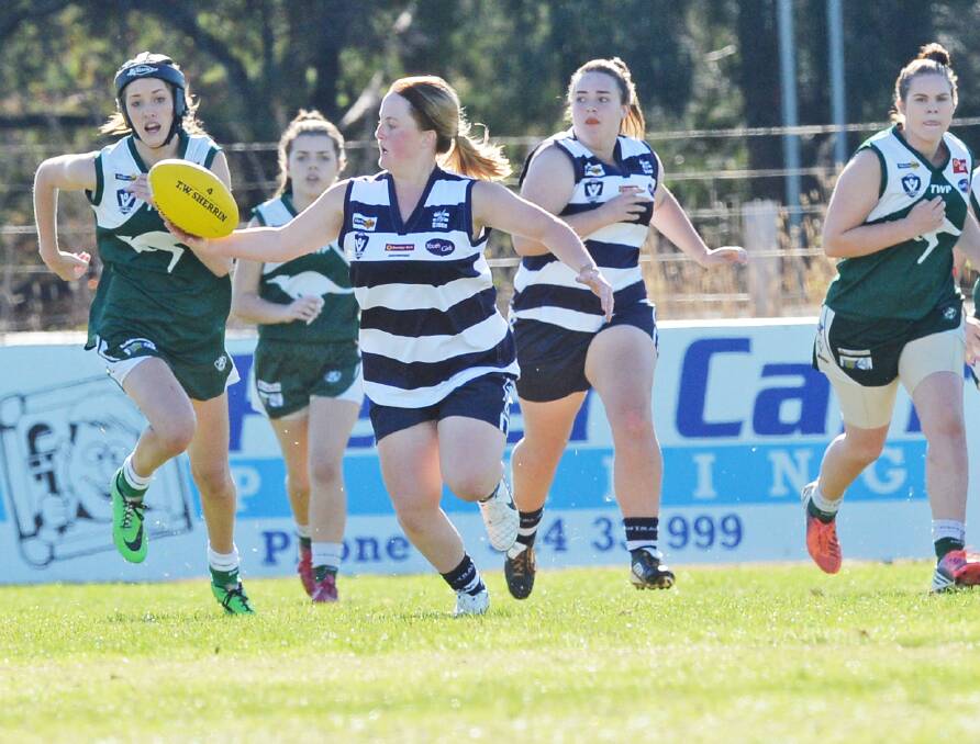 ON THE RUN: Action from the Strathfieldsaye versus Kangaroo Flat BJFL youth girls game at Flight Centre Park. Picture: DARREN HOWE