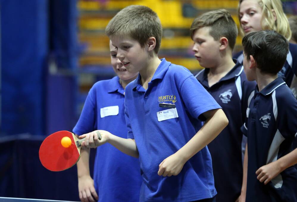 PING PONG: Ned from Huntly Primary School tries his hand at table tennis at Bendigo Stadium on Tuesday. Picture: GLENN DANIELS