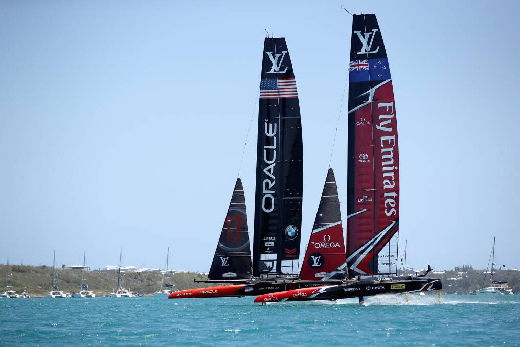 SPEED MACHINES: Team New Zealand, right, leads Team USA in race three of the America's Cup series. Picture: GETTY IMAGES