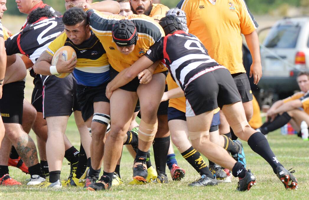 HARD AT IT: The Bendigo Fighting Miners' forwards did some damage in the second half of Saturday's clash with Kiwi Hawthorn.