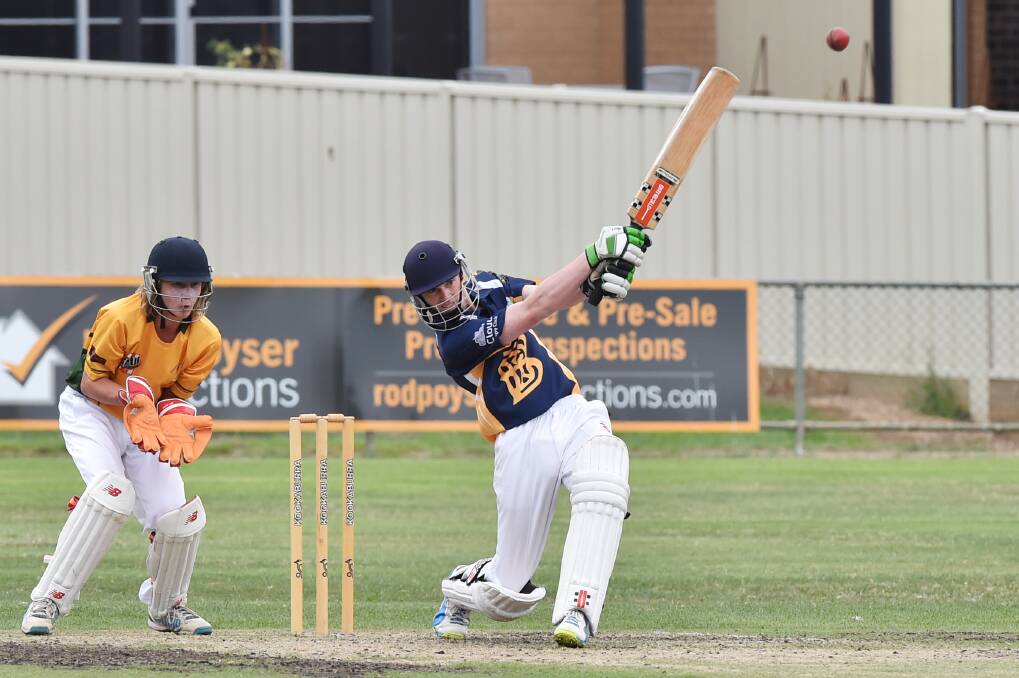 Bendigo under-17 batsman Matt Long slams a boundary in his innings of 18 against Murray Valley. Picture: DARREN HOWE