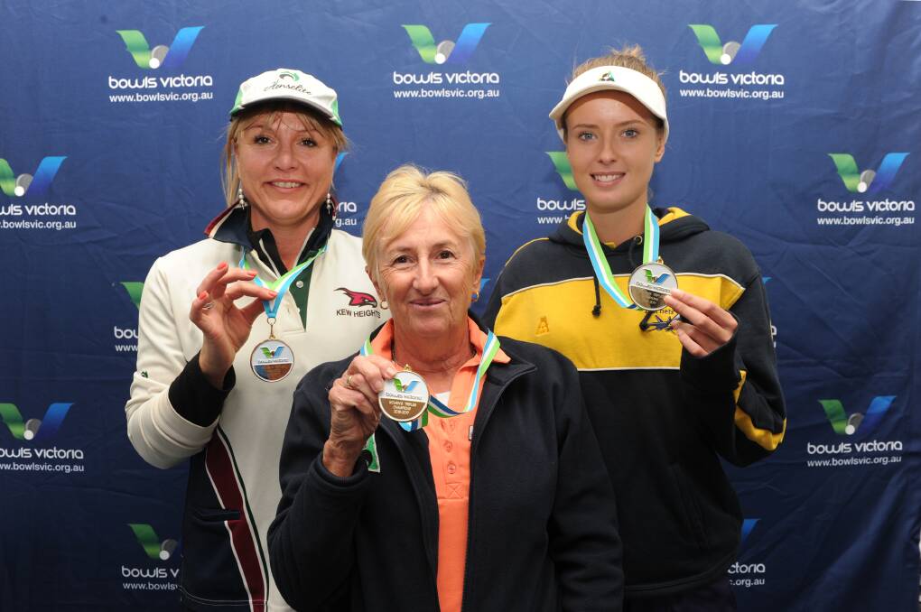 TRIPLE TREAT: Tristania Doolan, Sue Ferguson and Makayla Gibson won the women's triples final at the state titles in Bendigo. Picture: NONI HYETT