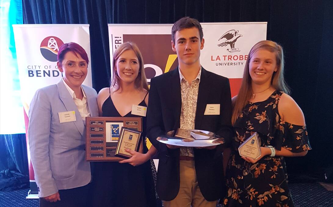 Paralympian Amanda Reynolds with BAS coach of the year Maddie Batters, BAS athlete of the year James Humphry and canoeing award winner Ashlee Ilott. Picture: CONTRIBUTED