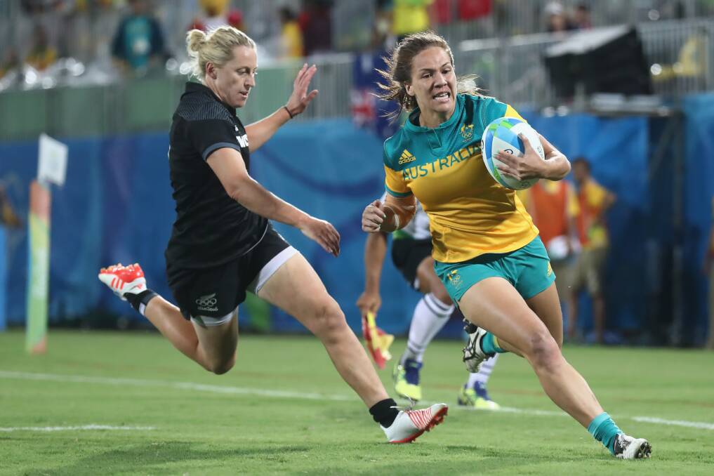 Australia's Evania Pelite on her way to scoring a crucial try against New Zealand in the gold medal game at the Rio Olympics. Picture: GETTY IMAGES