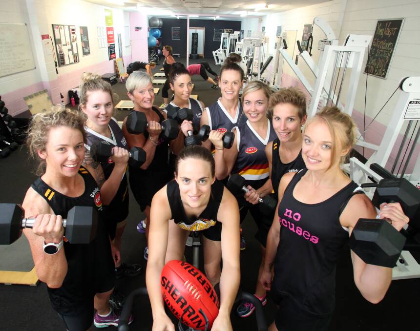 PUMPED UP: It's Her Gym's Sue Walton, right, with members of the Bendigo Thunder playing group. Picture: GLENN DANIELS