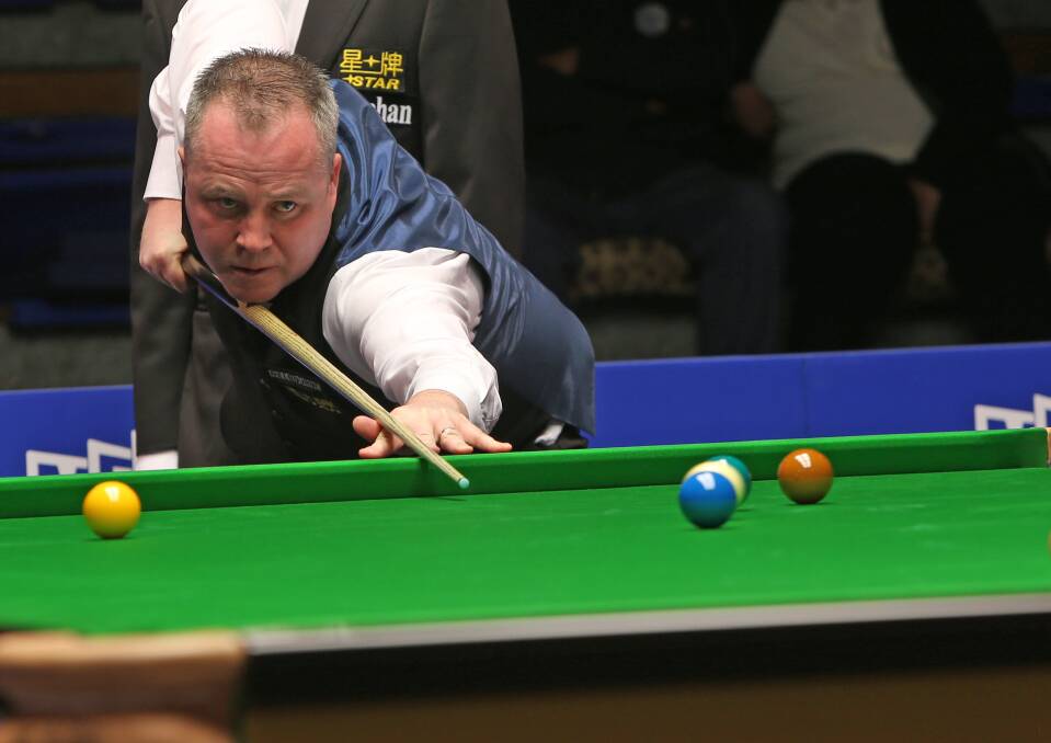 CONCENTRATION: Scotland's John Higgins in action on day one of the Australian Snooker Goldfields Open. Higgins defeated Michael Georgiou 5-2.