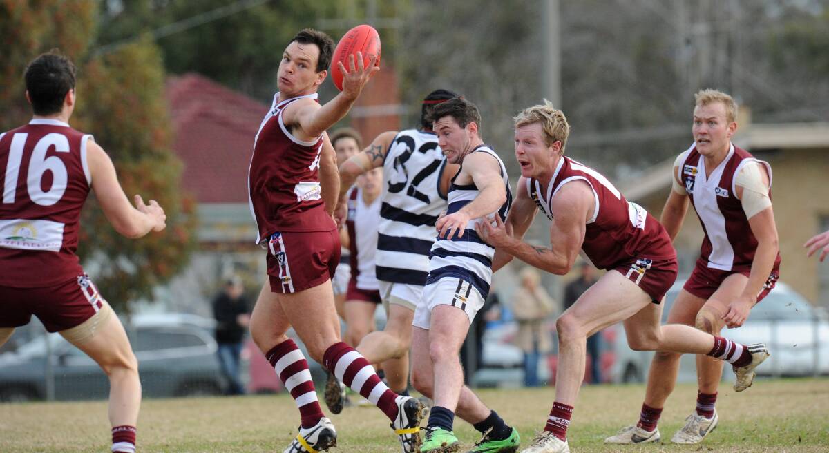 STRANGE GAME: The YCW-Newbridge clash was tight for three quarters before the Maroons grabbed hold of the match. Picture: NONI HYETT