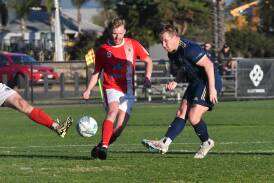 Sam Farr shoots at goal in Saturday's 2-1 win over Ballarat SC at Epsom-Huntly Recreation Reserve. Picture by Adam Bourke