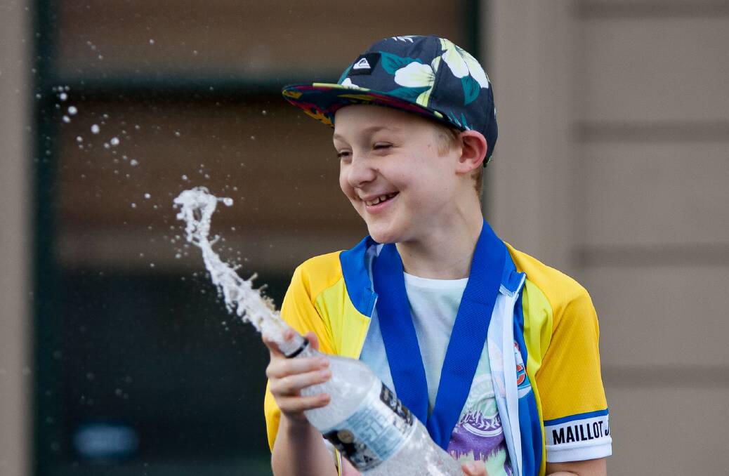 WINNERS ARE GRINNERS: Angus Gill celebrates his under-11 victory. Picture: DION JELBART PHOTOGRAPHY