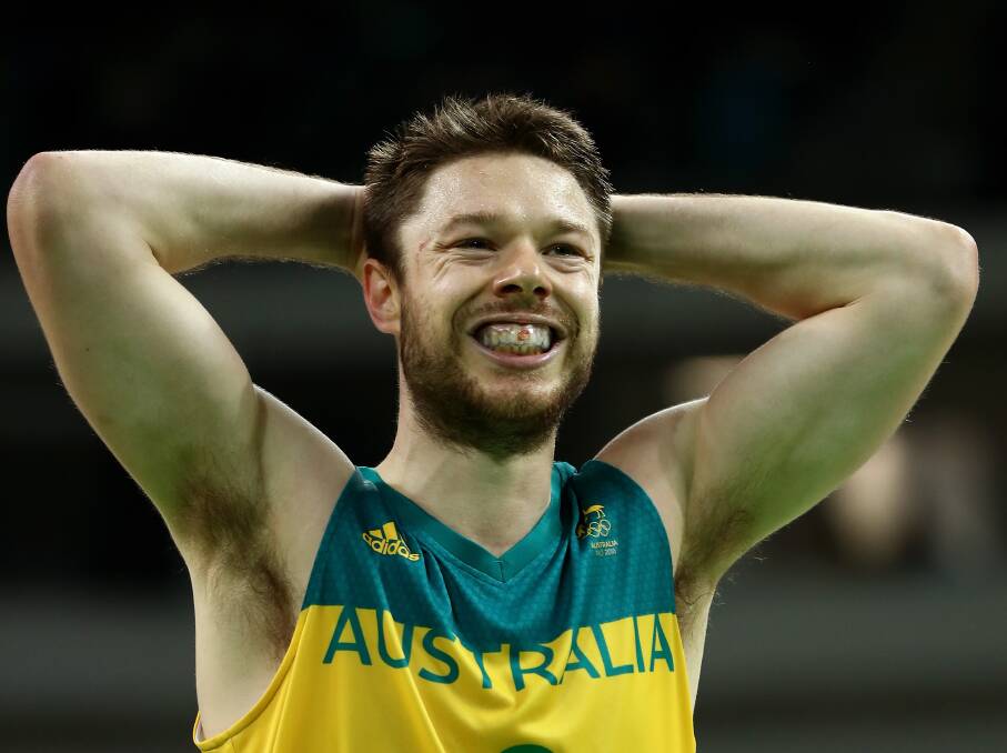 Matthew Dellavedova grimaces in the bronze medal game against Spain.