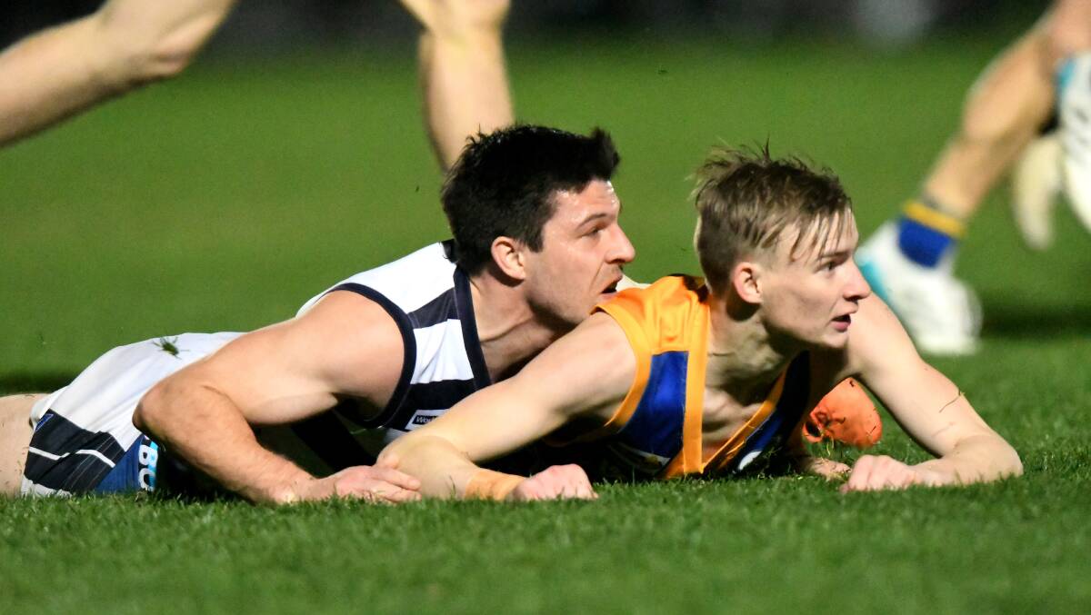 BEST ON GROUND: Strathfieldsaye's Kallen Geary after laying a tackle on Golden Square youngster Bailey George. Picture: NONI HYETT