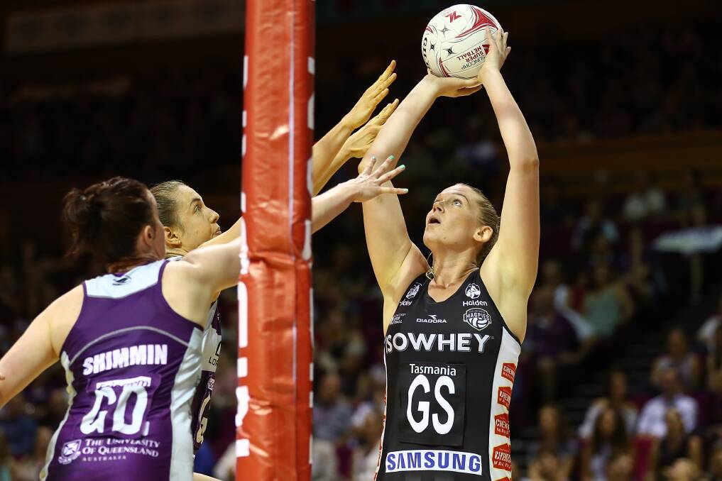 HARD TO STOP: Caitlin Thwaites lines up a goal for Collingwood in the Magpies' win over the Queensland Firebirds on Saturday night. Picture: GETTY IMAGES