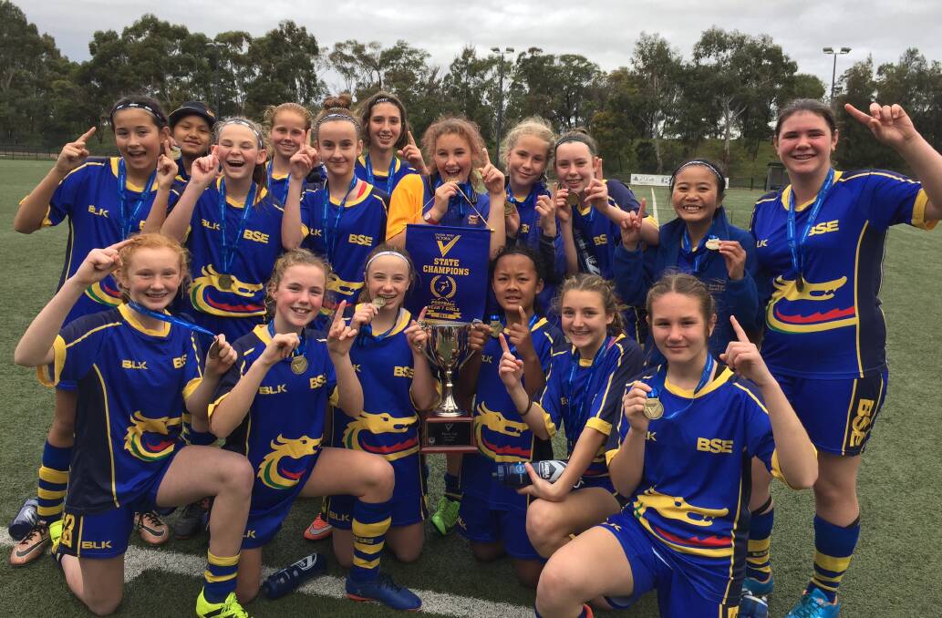 BEST IN STATE: Bendigo South East College's Year 7 girls soccer players after their grand final win.
