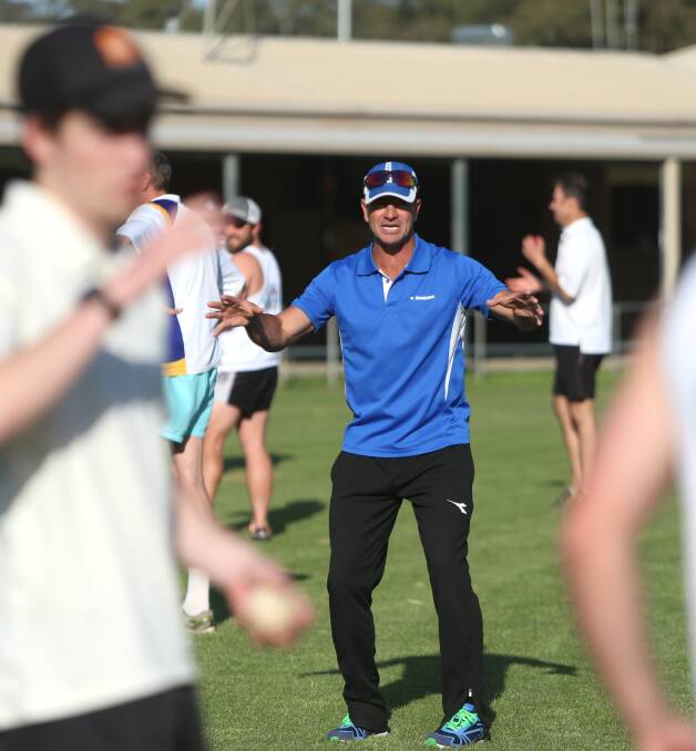 EXPERIENCE: Former Melbourne Renegades coach Simon Helmot puts Huntly-North Epsom players through their paces on Thursday night. Picture: GLENN DANIELS